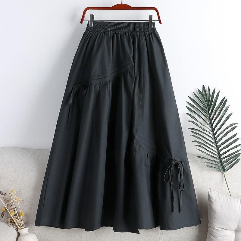 Jupe longue noire taille élastiquée avec poches et liens, style féminin élégant pour toutes les occasions