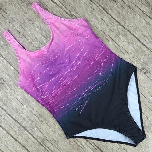 Maillot de bain une pièce dégradé rose violet noir, design moderne pour plage ou piscine