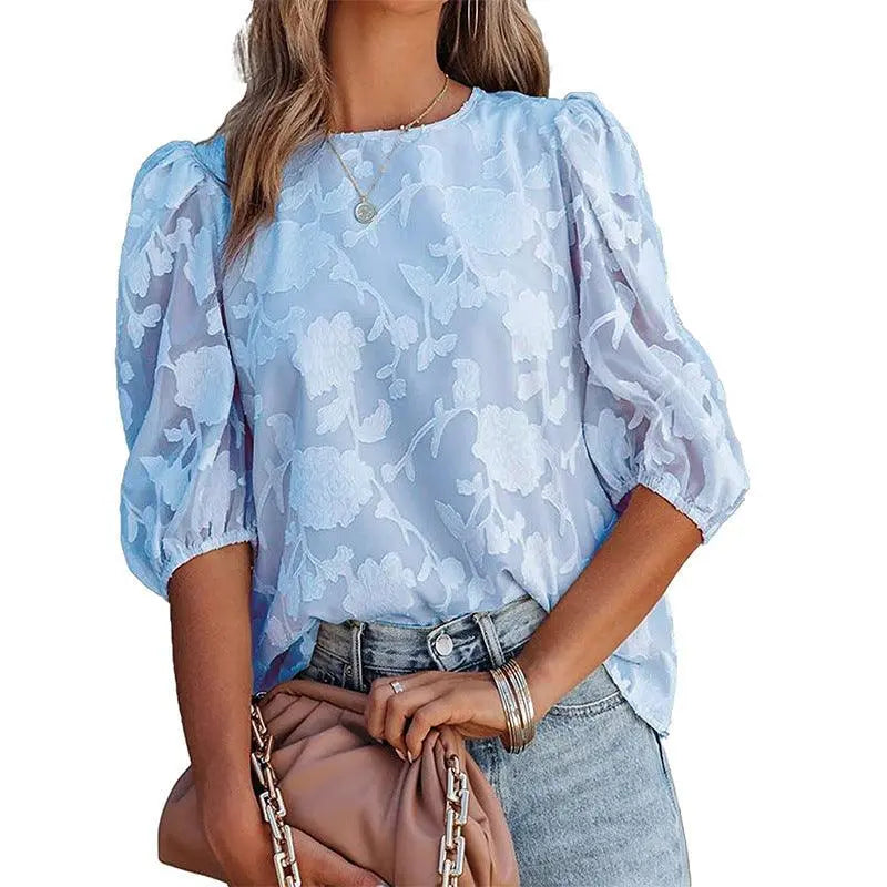 Blouse féminine bleue à manches bouffantes et imprimé floral, style bohème élégant