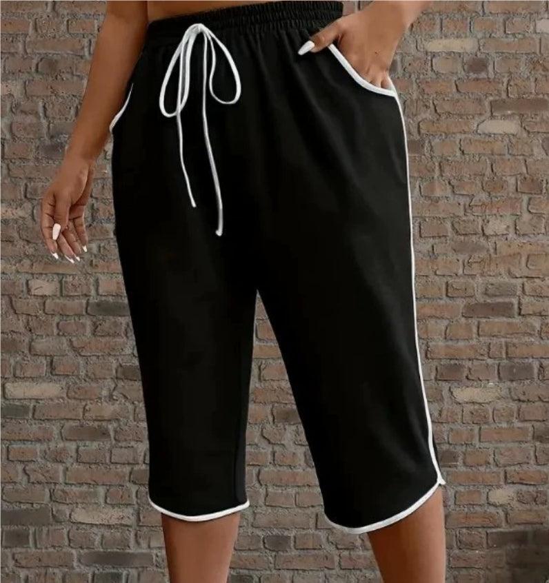Shorts noirs féminins avec cordon blanc et poches, style décontracté pour mode femme