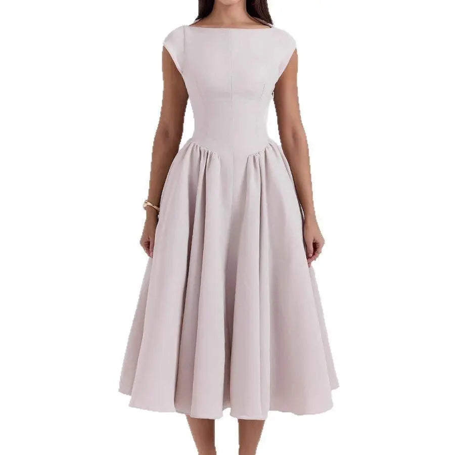Robe féminine élégante rose pâle, manches courtes, taille cintrée, style vintage