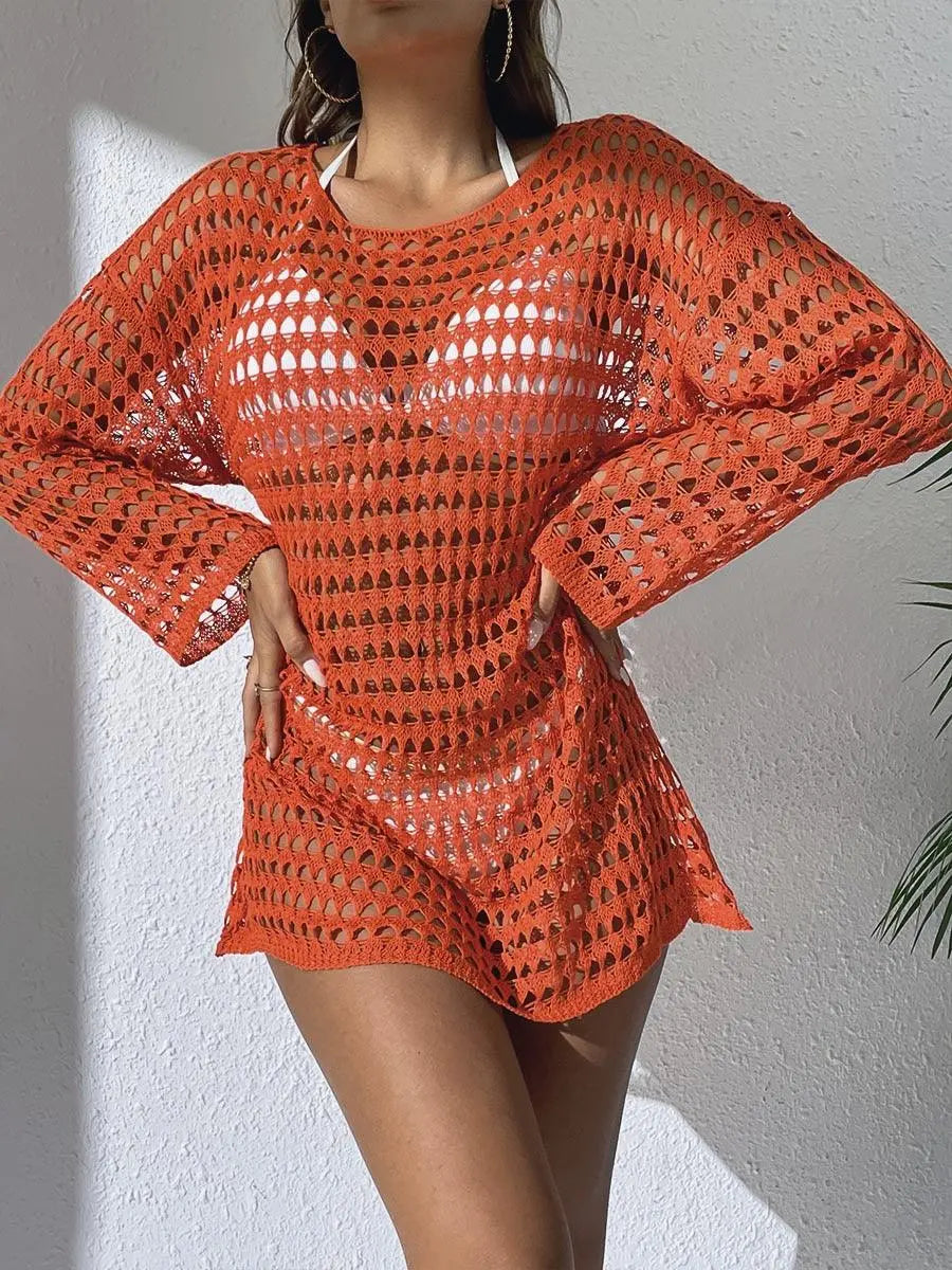 Robe bohème orange en maille ajourée, style été féminin, idéale pour plage ou vacances