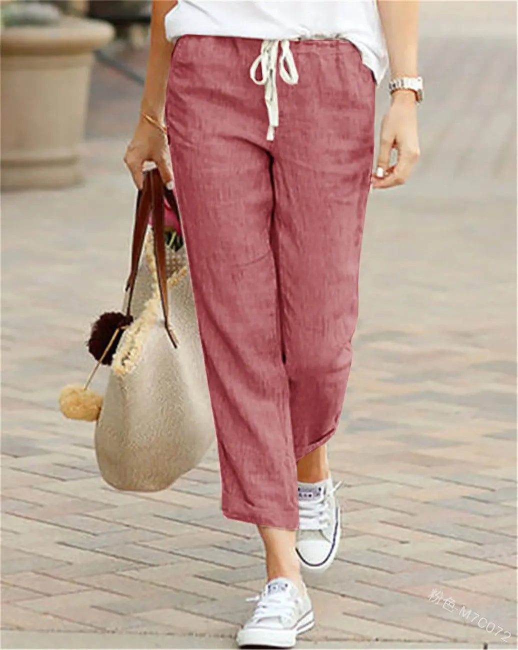Pantalon rose femme en lin, coupe ample avec cordon, idéal pour un look bohème et décontracté