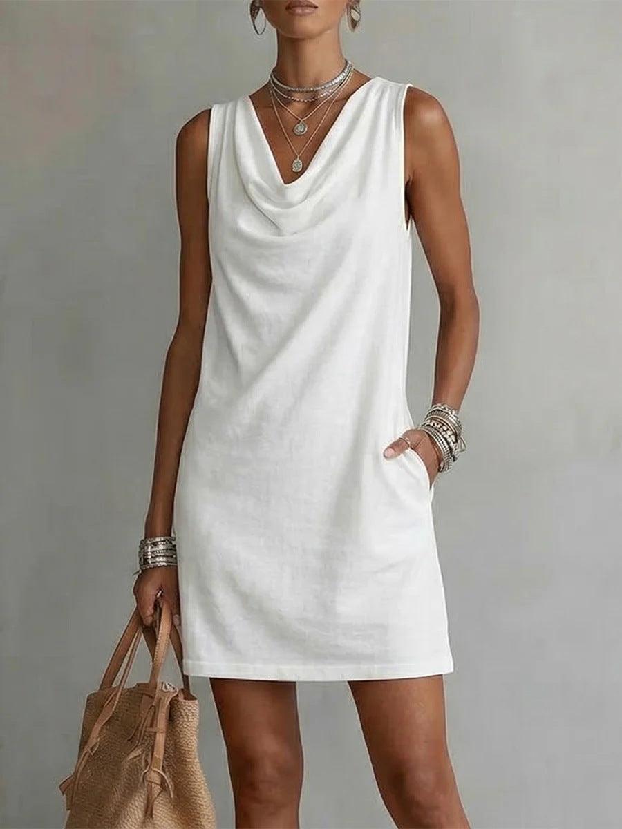 Robe blanche sans manches col drapé, style bohème féminin avec poches et accessoires