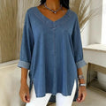 Tunique en jean bleu femme, col V, manches 3/4, coupe ample et fentes latérales, style décontracté
