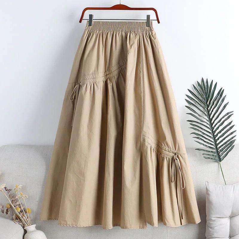 Jupe longue beige à volants et poches, style bohème féminin, taille élastiquée