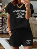 T-shirt noir imprimé montagnes 'The Mountains 1998 Adventure' et short assorti, style décontracté féminin