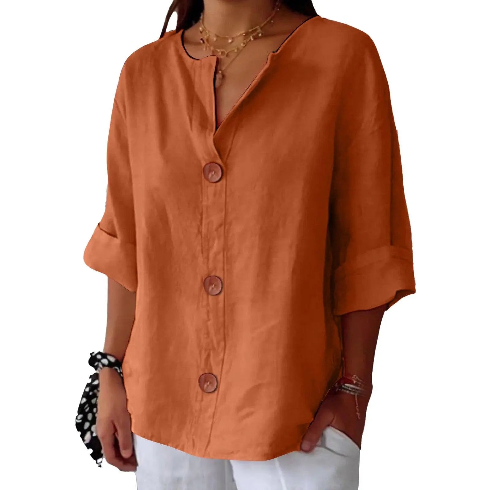 Blouse féminine orange à manches 3/4 et boutons, style bohème chic pour tenue décontractée