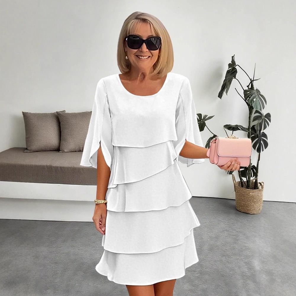 Robe blanche à volants et manches larges, style féminin élégant pour toutes occasions