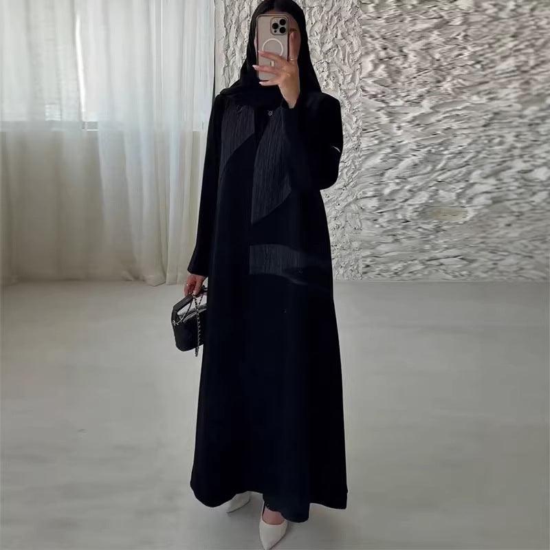 Robe longue noire élégante à manches longues, style féminin moderne, idéale pour toutes les occasions
