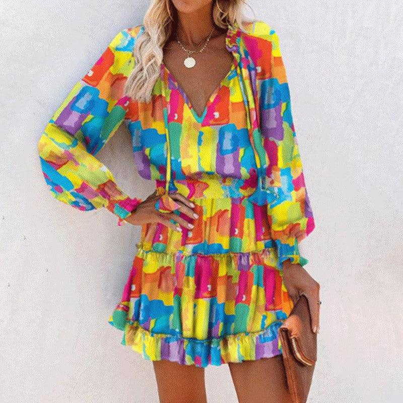 Robe bohème colorée à imprimé géométrique, manches longues et volants, idéale pour l'été