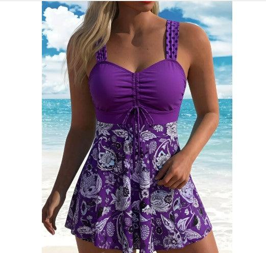 Robe de plage violette à imprimé floral, idéale pour l'été et les vacances au bord de mer.
