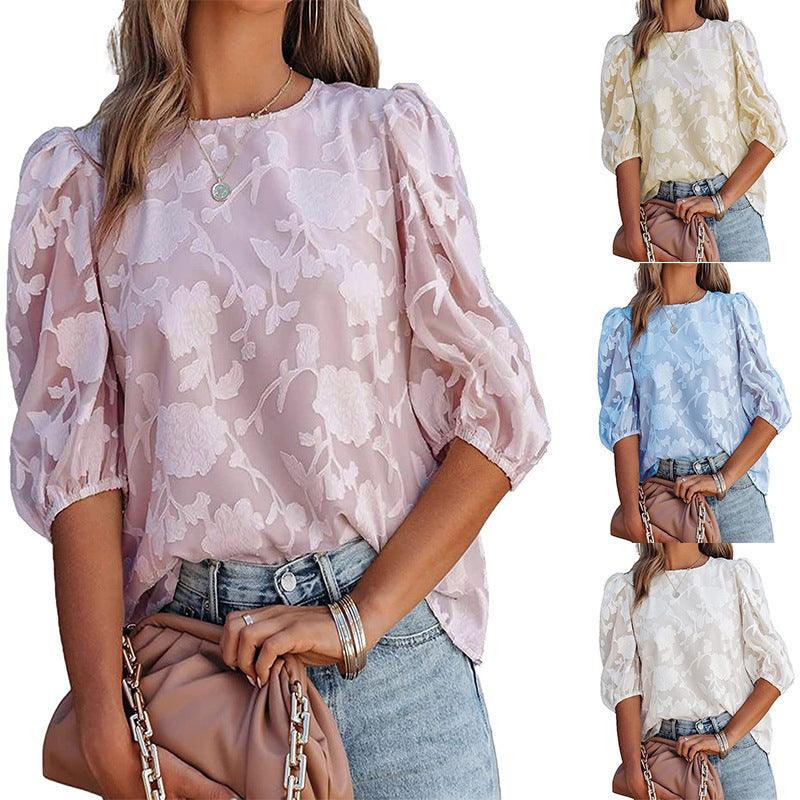 Blouse féminine à manches bouffantes et imprimé floral, idéale pour un style bohème chic