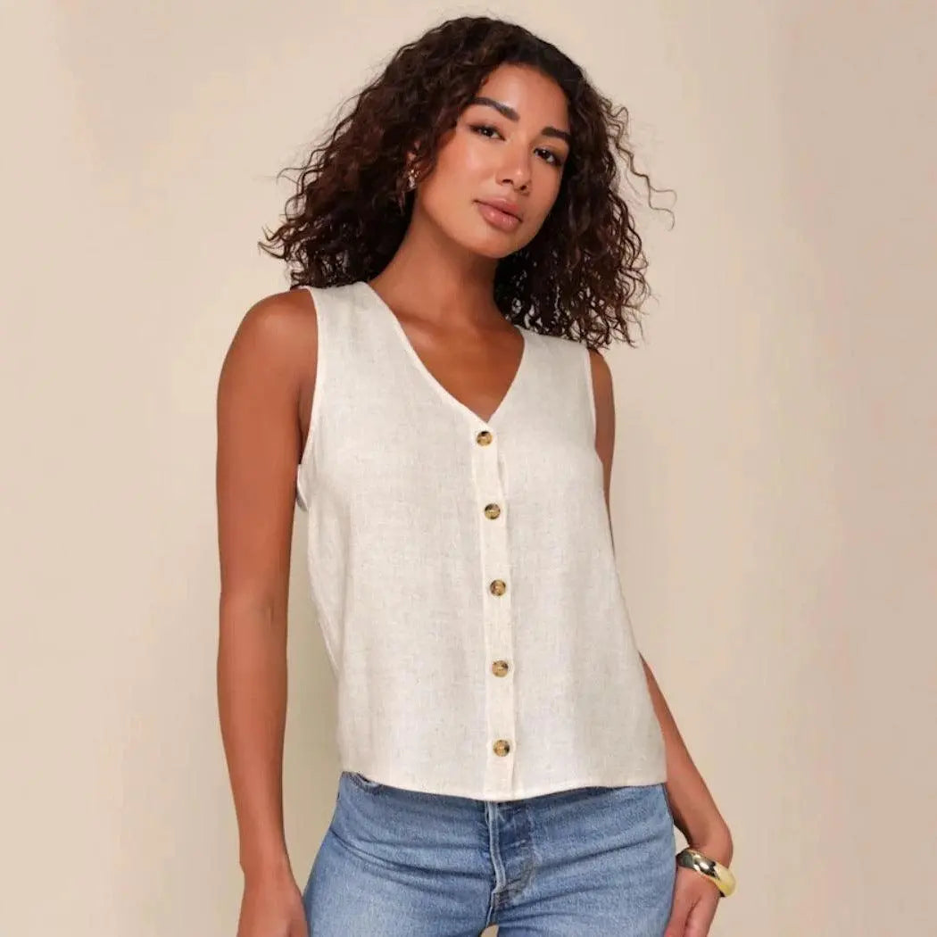 Top féminin blanc sans manches à boutons dorés, style élégant et décontracté