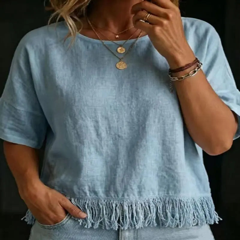 Top féminin bleu clair à franges, manches courtes, style bohème élégant