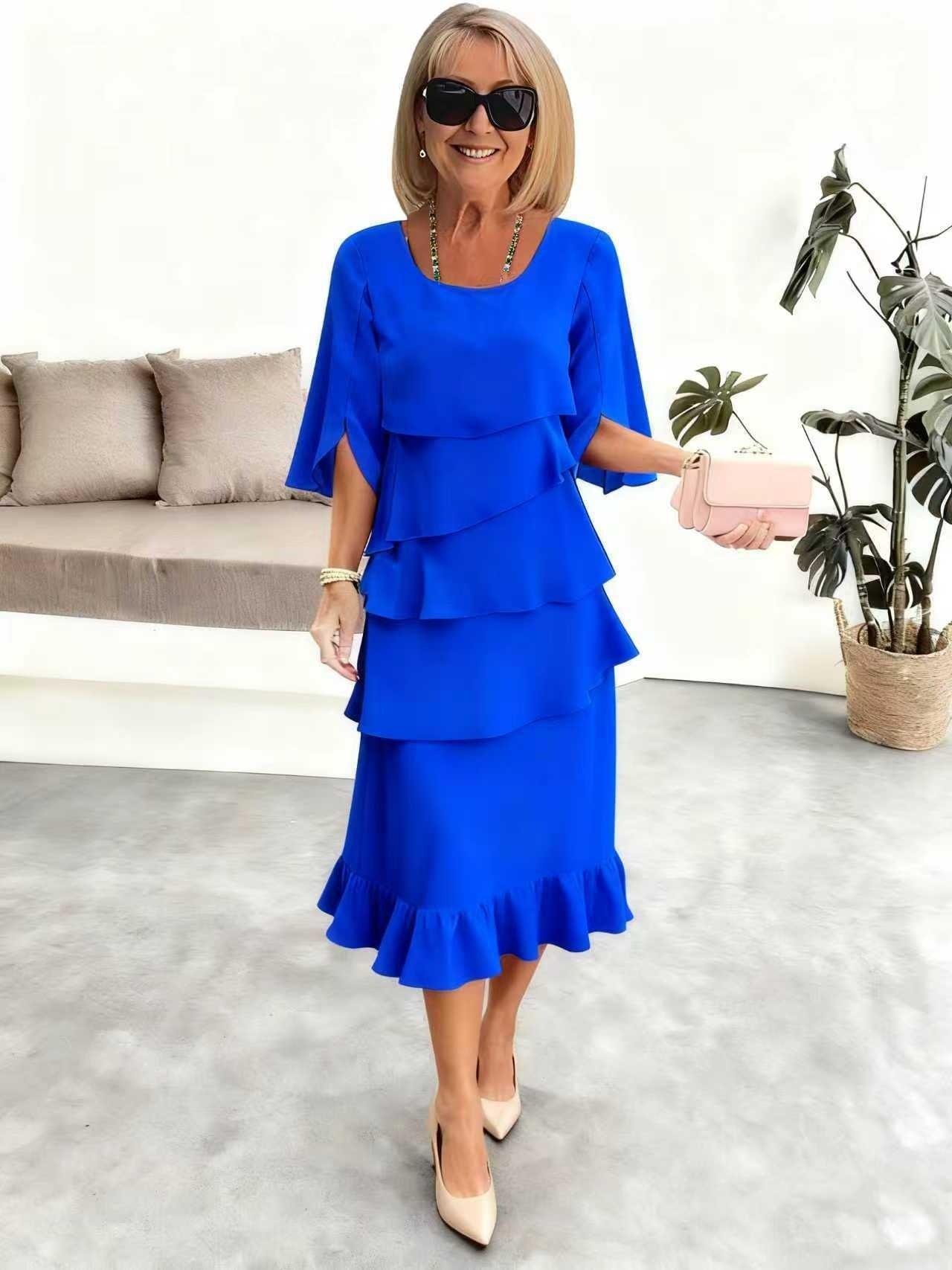 Robe bleue à volants pour femme, style élégant avec manches courtes et sac rose