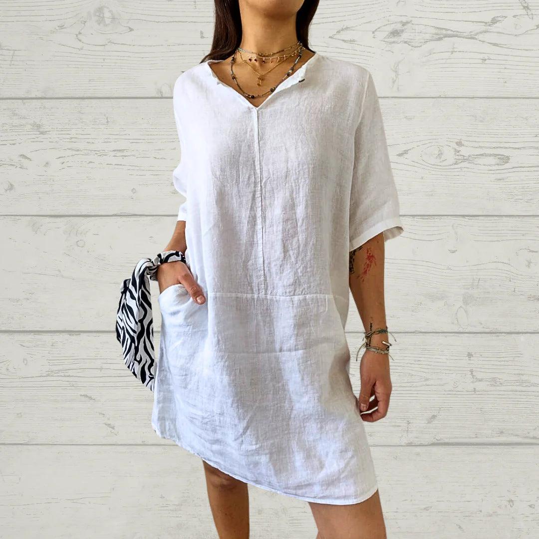 Robe blanche en lin, manches courtes, style bohème élégant, poches pratiques, look féminin décontracté