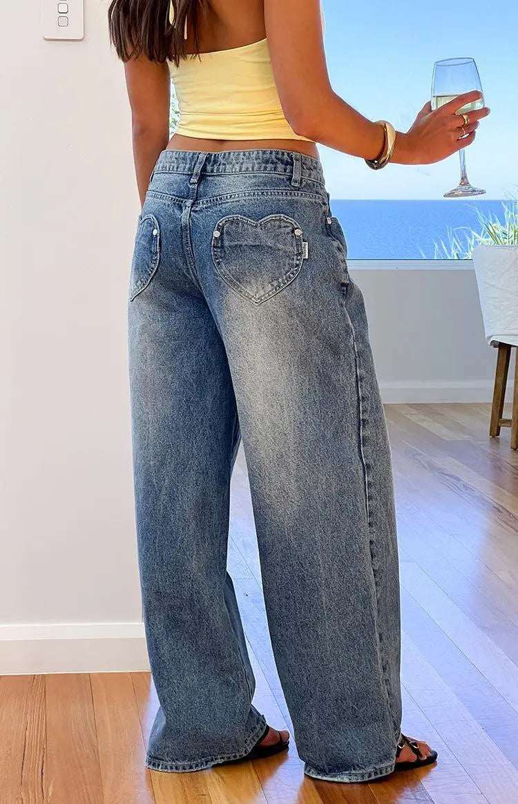 Jeans larges femme avec poches cœur, style bohème chic pour look estival