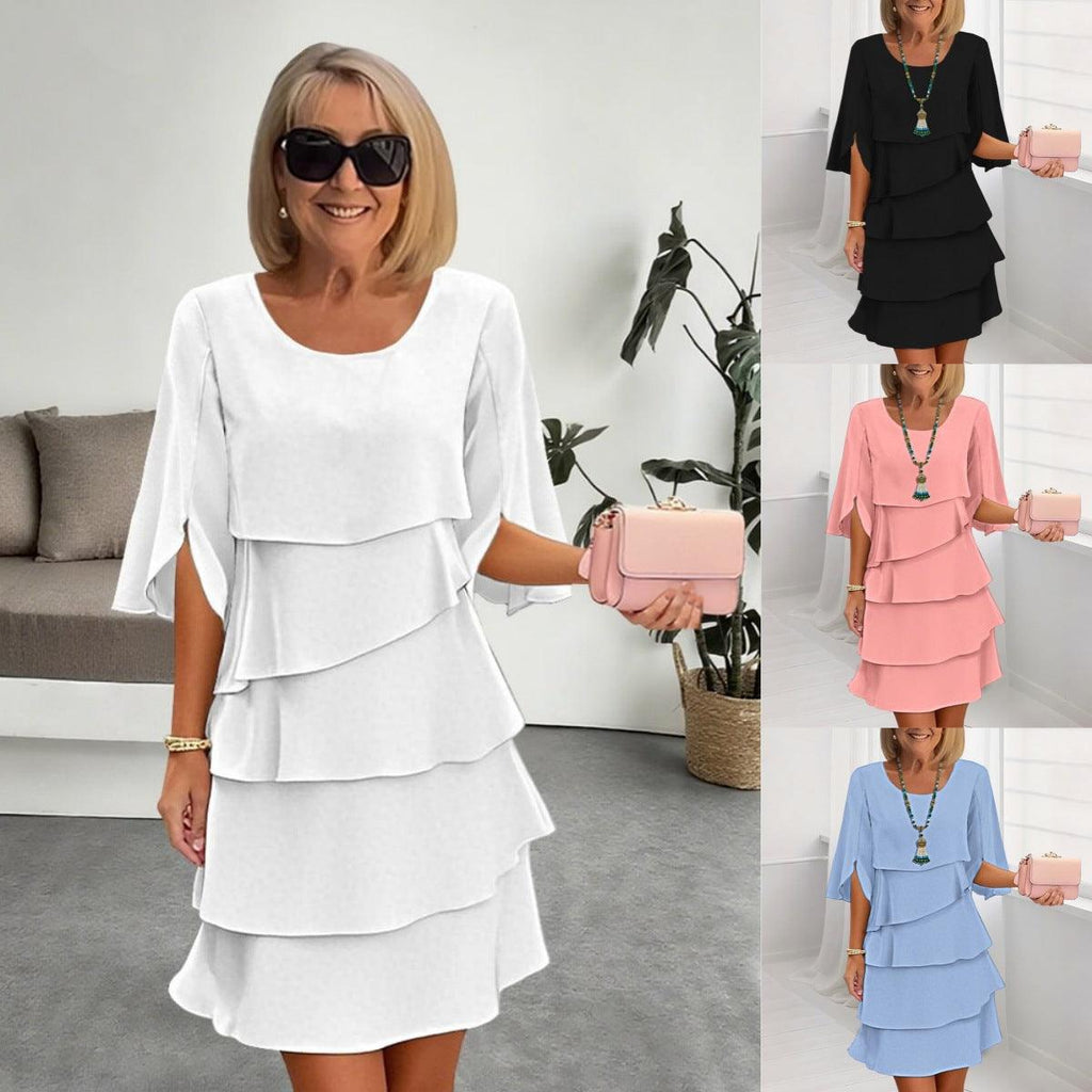Robe féminine à volants en blanc, noir, rose et bleu, idéale pour toutes occasions