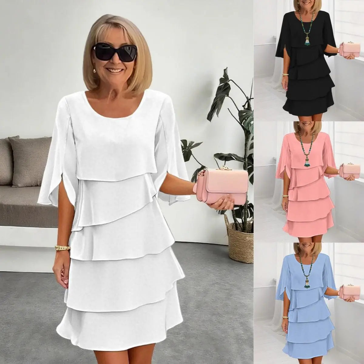 Robe féminine à volants en blanc, noir, rose et bleu, idéale pour toutes occasions