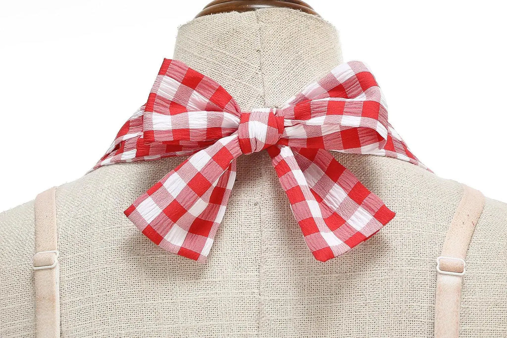 Foulard à carreaux rouges et blancs en noeud papillon, accessoire féminin élégant