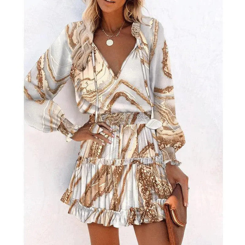Robe bohème imprimée dorée à manches longues et volants, style féminin élégant