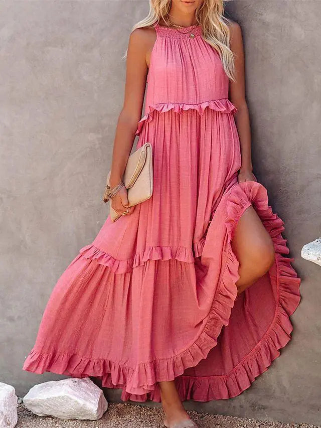 Robe bohème rose à volants, style féminin pour été, idéale pour plage ou soirée