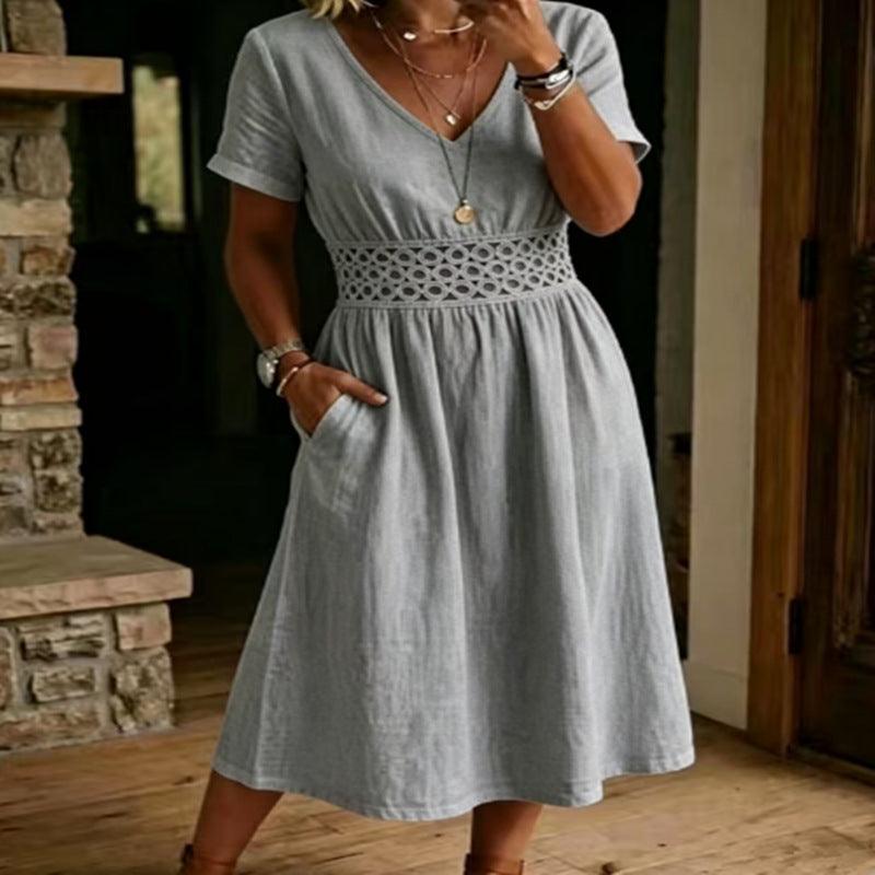 Robe bohème verte claire à broderies florales, manches courtes, taille élastiquée, style féminin élégant