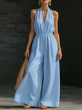 Combinaison bleue femme à col halter et larges jambes, style bohème élégant