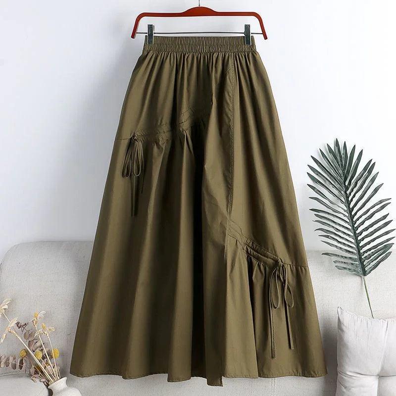 Jupe longue verte claire à poches et taille élastiquée, style bohème féminin élégant